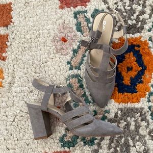 Never worn. Gray heels.